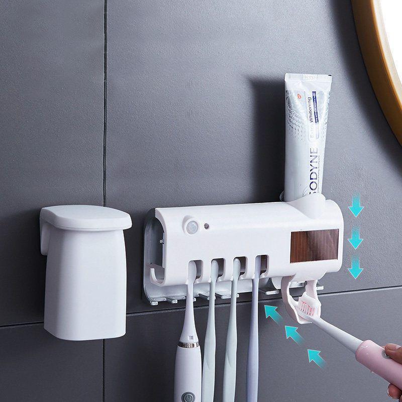 UV toothbrush holder with a paste dispenser - white