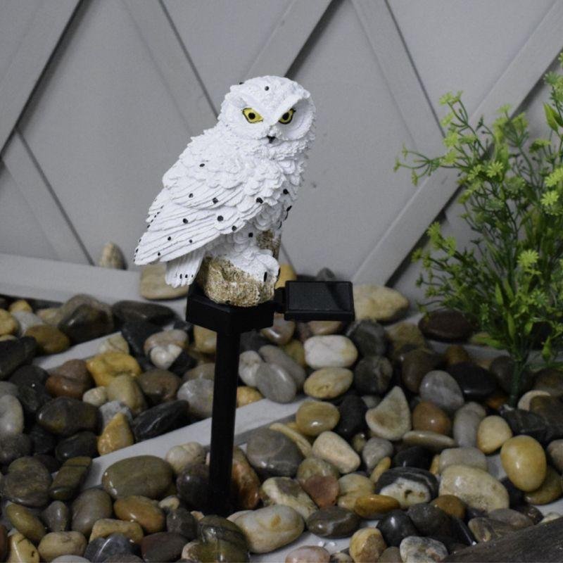 Decorative LED solar lamp for the garden Owl - white