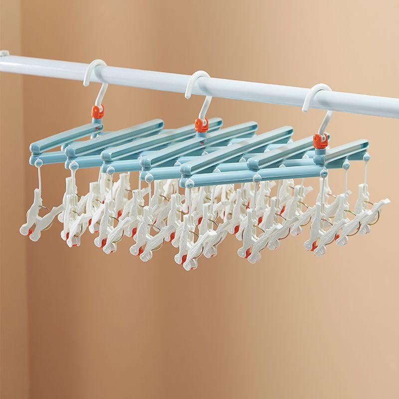 Plastic foldable clothes hanger with clips - 14 clips - light blue