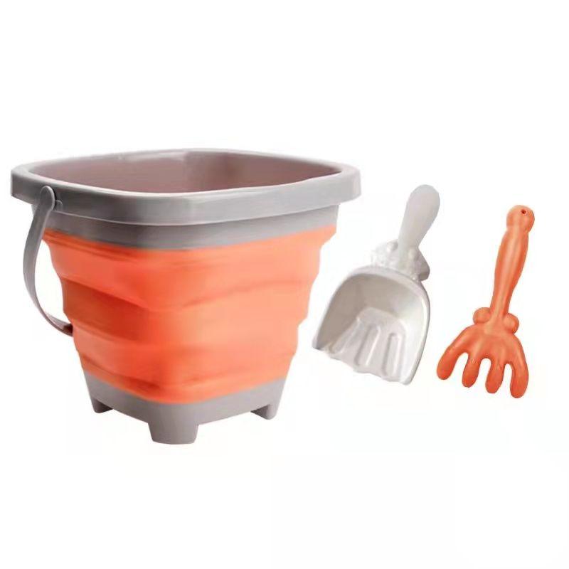 Collapsible silicone sand bucket with shovel and rakes