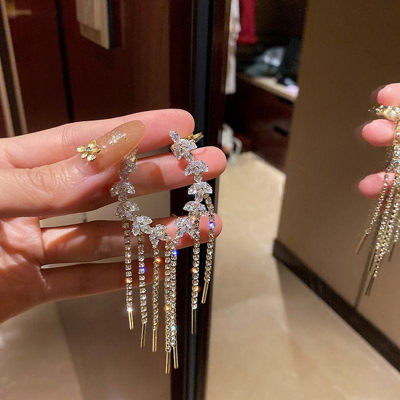 Long flowing crystal chain earrings - gold