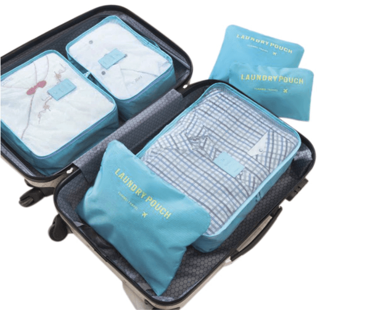A set of travel organizers for a suitcase and a wardrobe (6 pcs) — light blue
