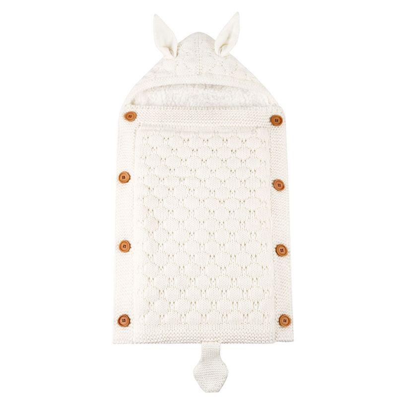 A sleeping bag for a stroller with rabbit ears - white