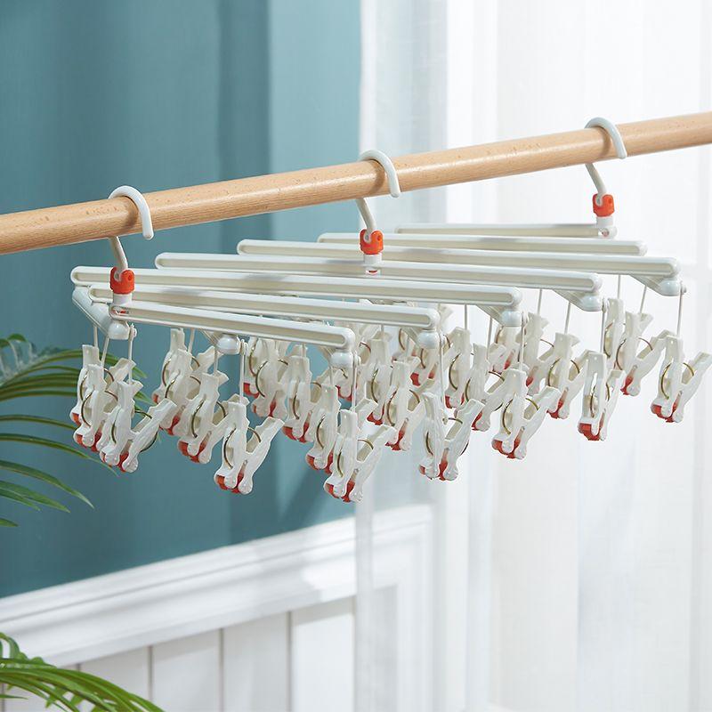 Plastic foldable clothes hanger with clips - 19 clips - white