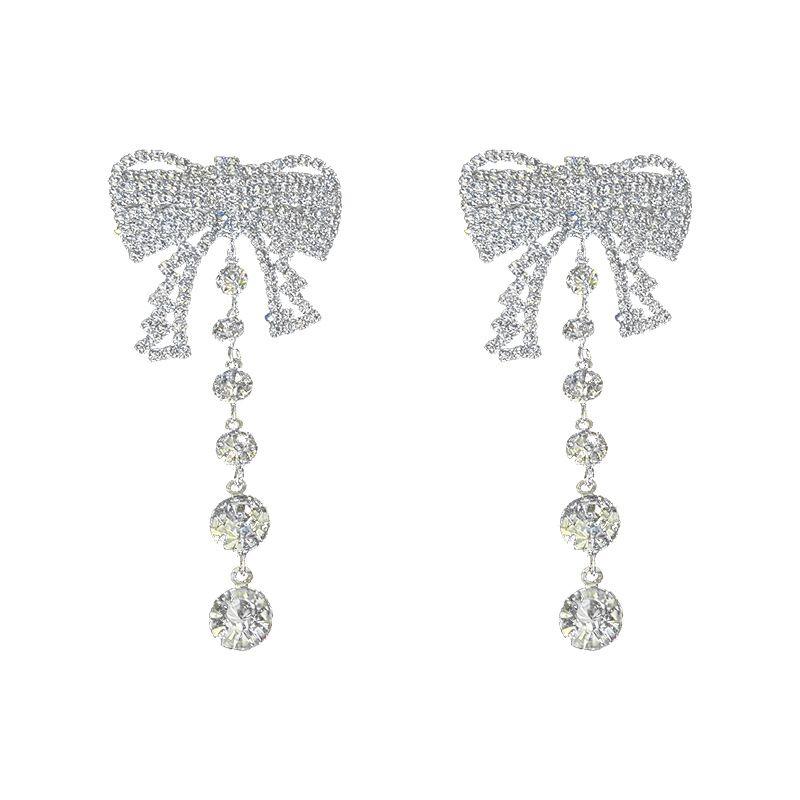 Long earrings with bow - silver