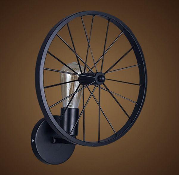 Wall lamp in the shape of a bicycle wheel, retro industrial style