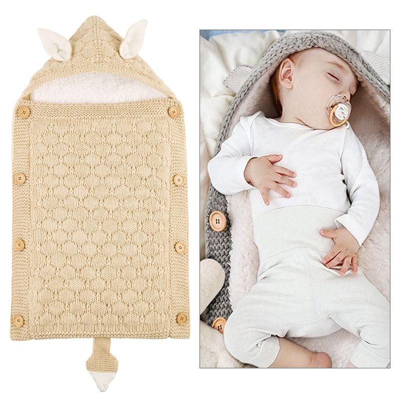 Baby sleeping bag with rabbit ears - cream