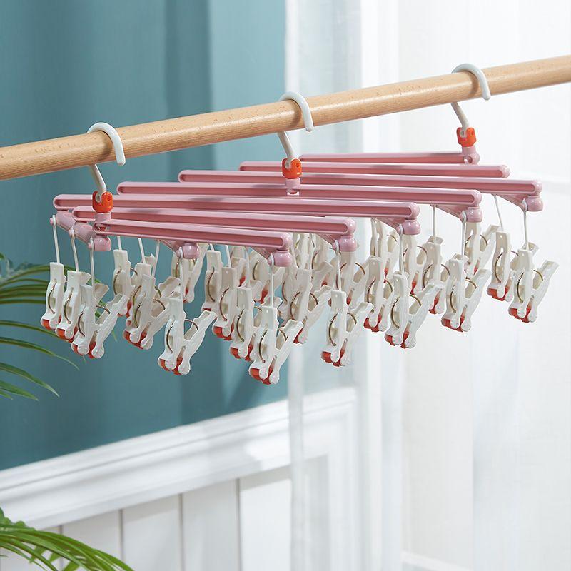 Plastic foldable clothes hanger with clips - 19 clips - pink