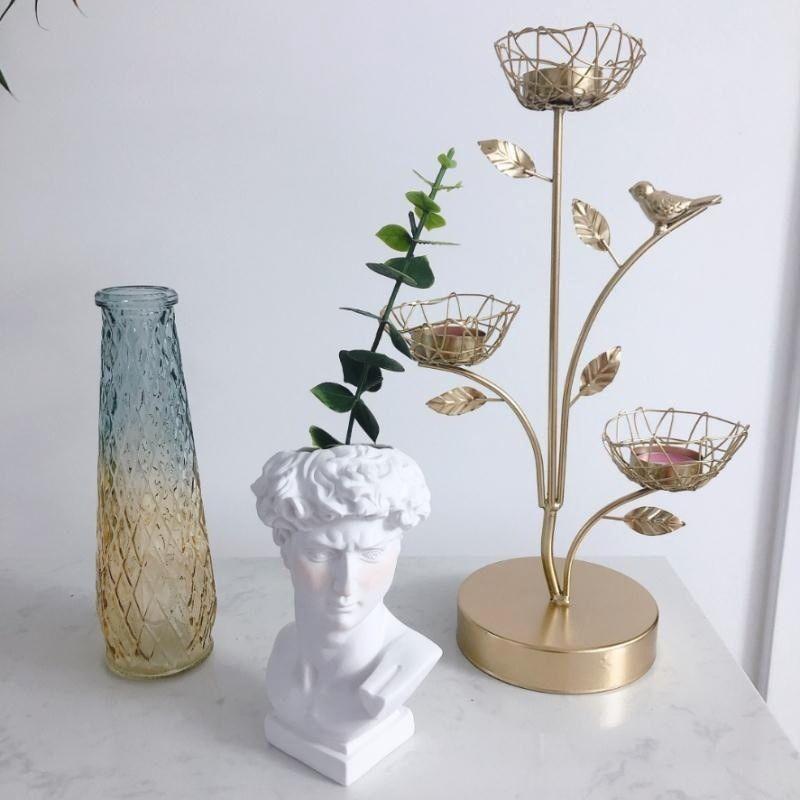 Decorative golden candlestick - three baskets