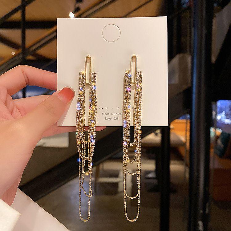 Long hanging earrings with chains - gold