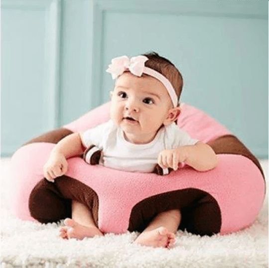 Plush child seat - pink brown