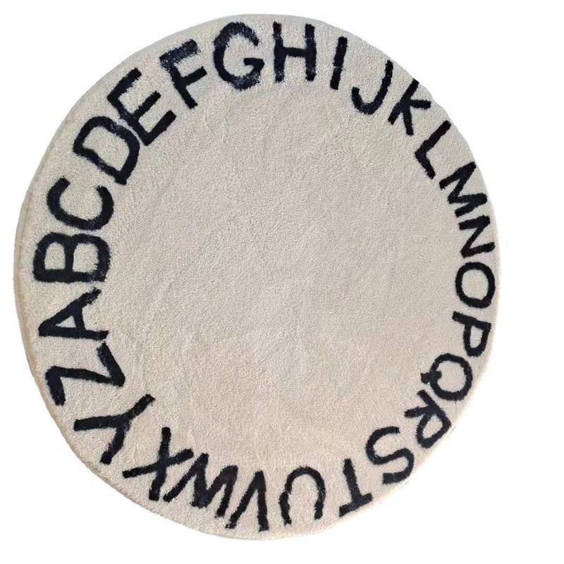 Round rug, non-slip 100 x 100 cm - Alphabet pattern